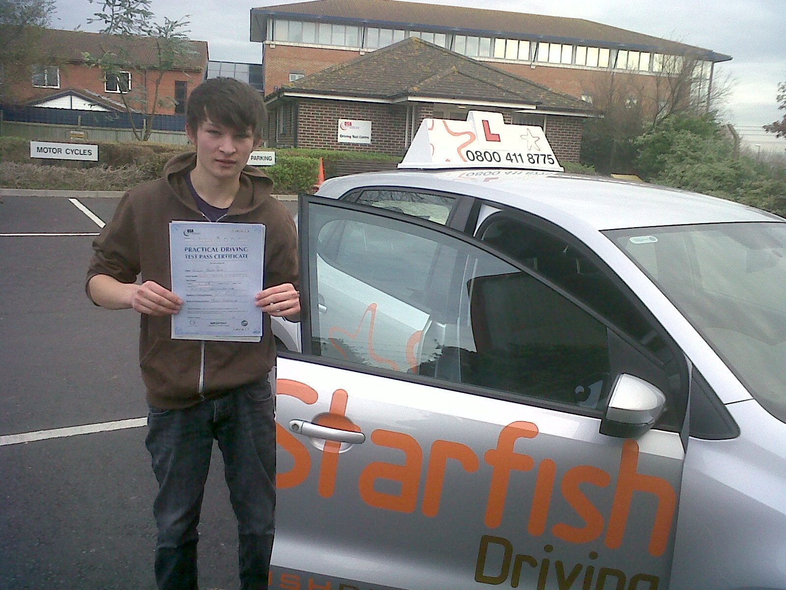 Will with his Driving Test Pass Certificate outside Weston-super-Mare Driving Test Centre