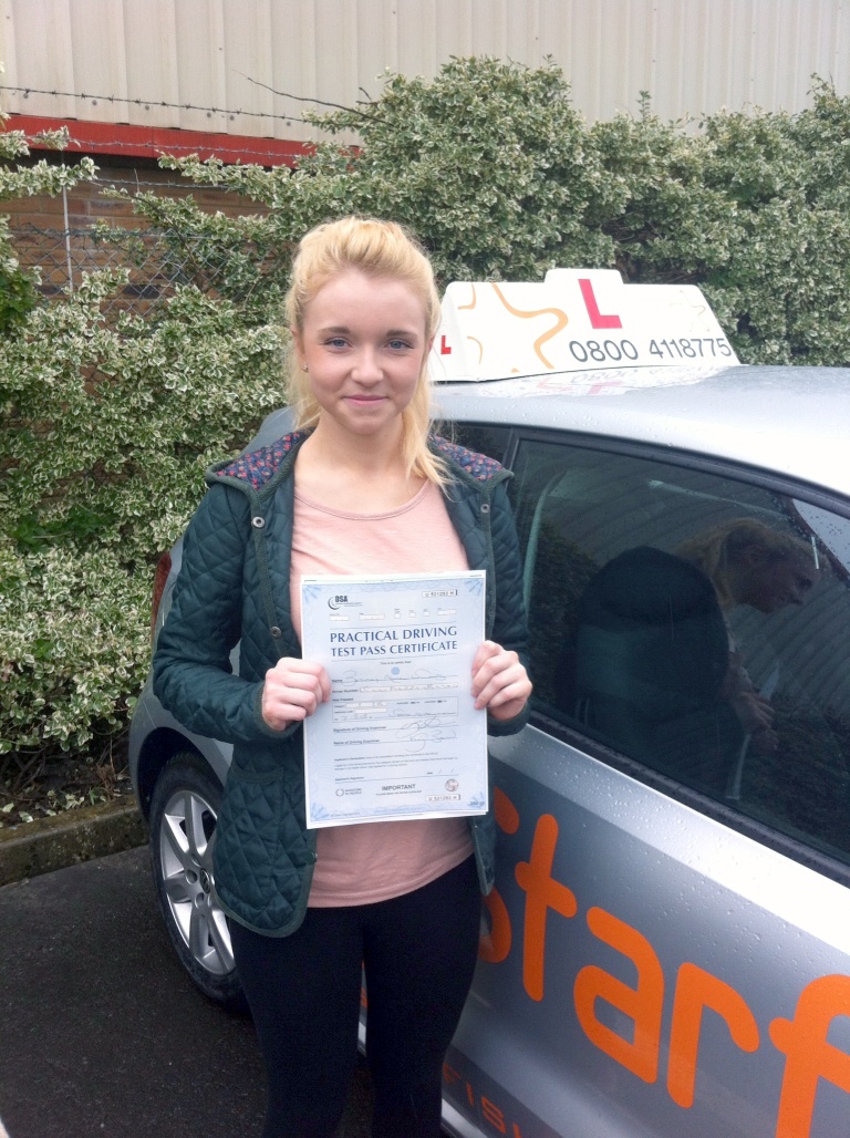 Bessie with her Practical Driving Test Pass Certificate outside Weston-Super-Mare Driving Test Centre
