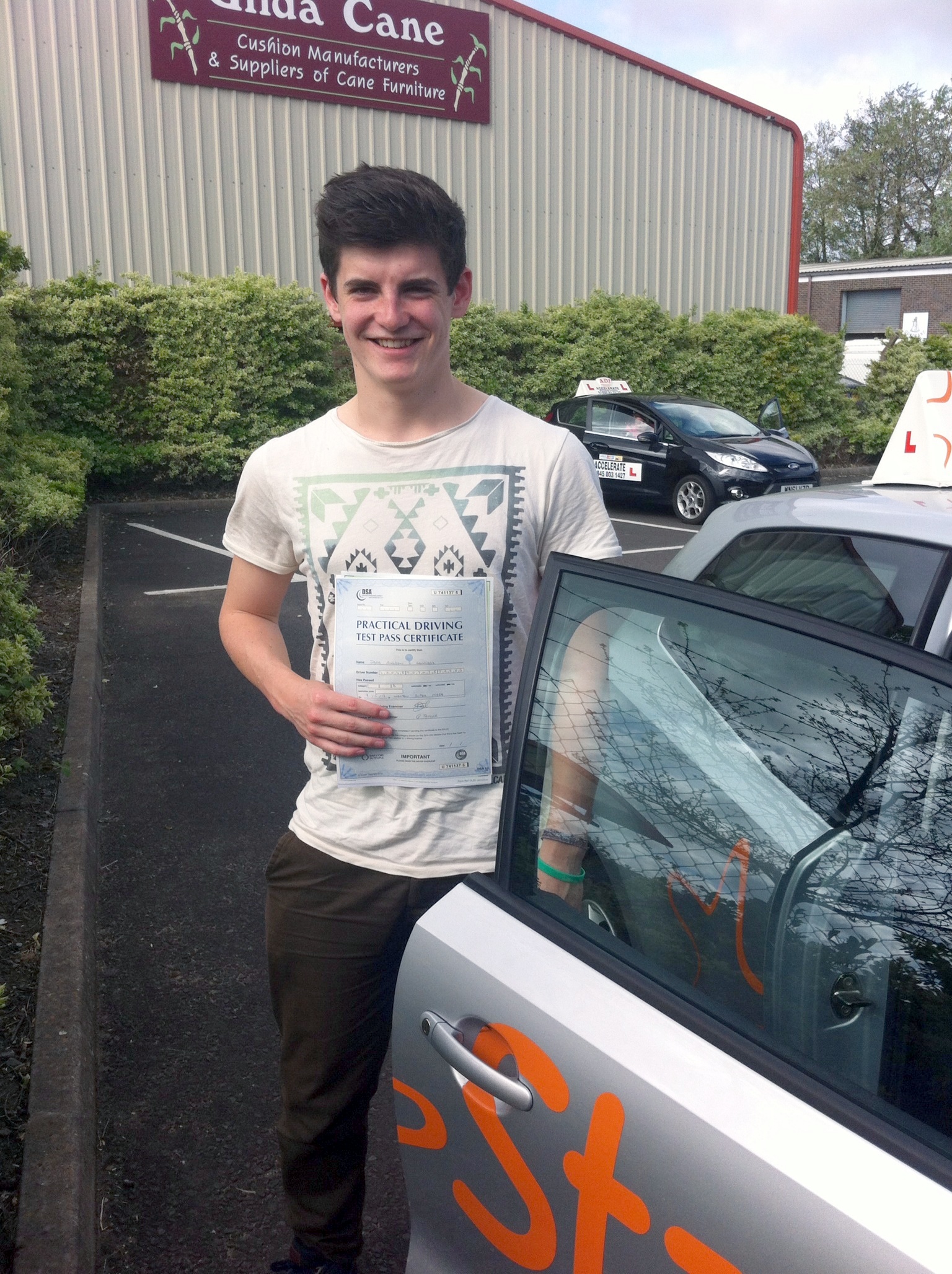 Jack with his PRactical Drving Test PAss Certificate outside Weston-Super-Mare Driving Test Centre