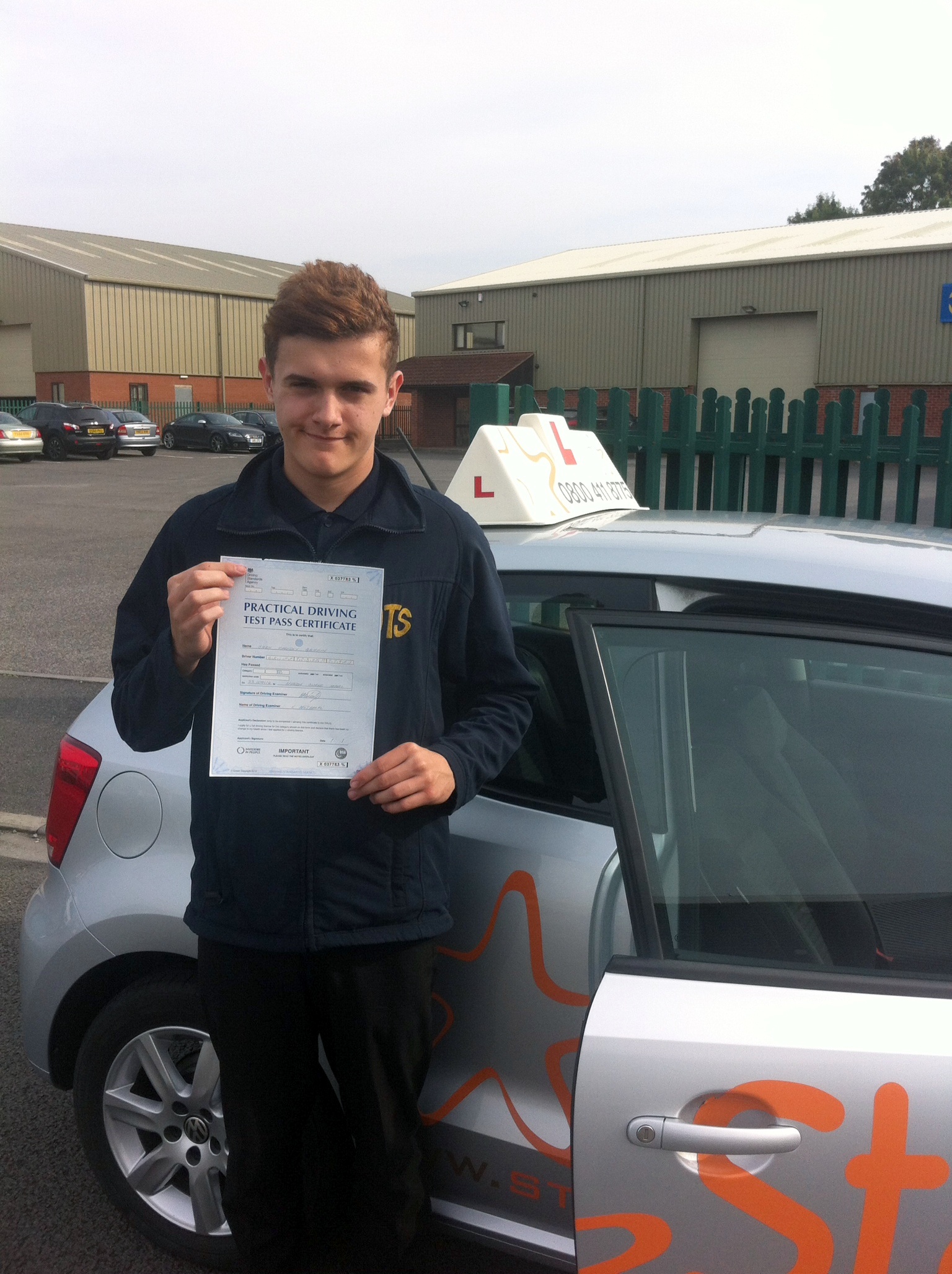 Jack with his Practical Driving Test Pass Certificate somewhere in Cheddar.