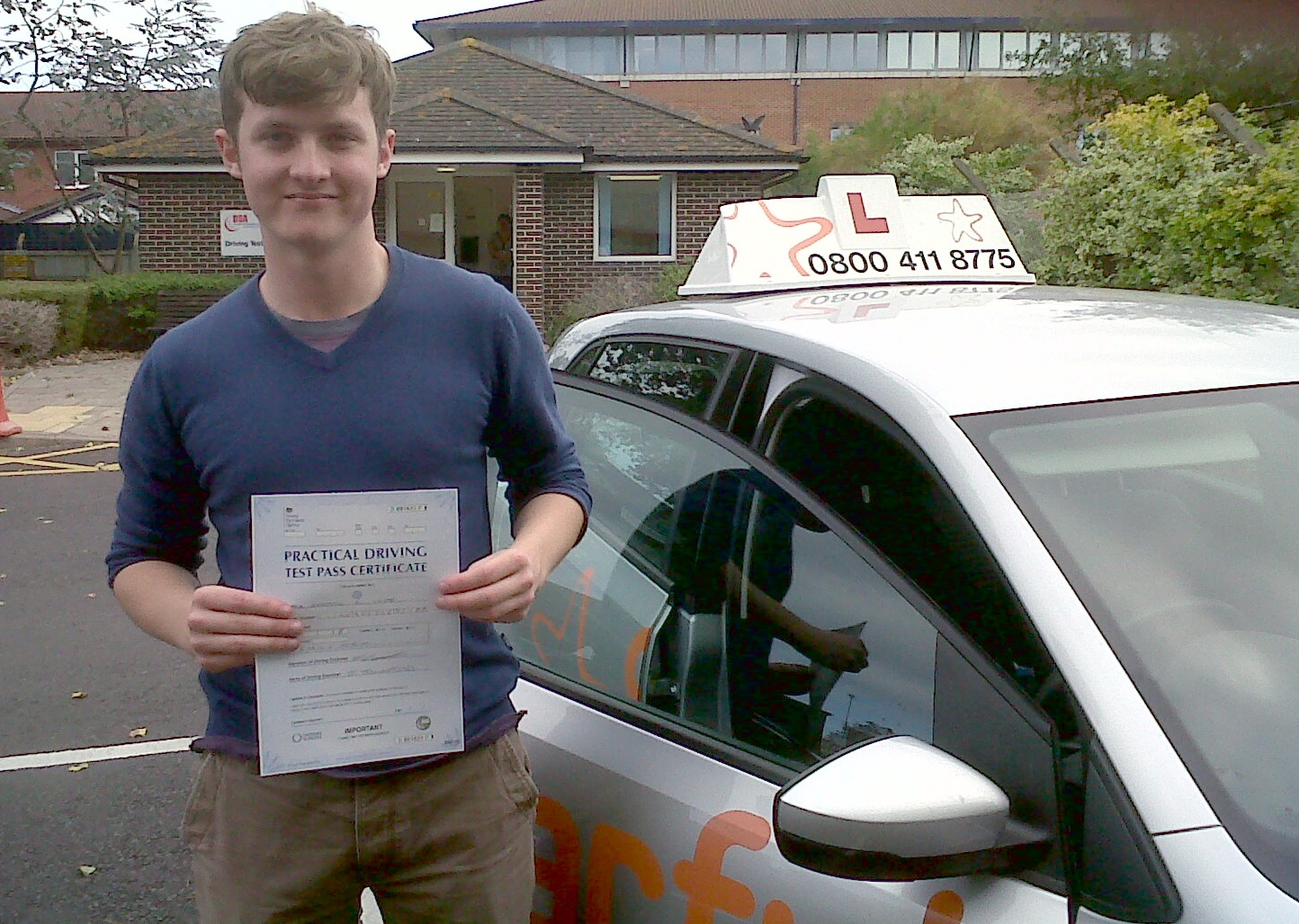 Ben with his Practical Driving Test Pass Certificate outside Weston Super Mare Driving Test Centre