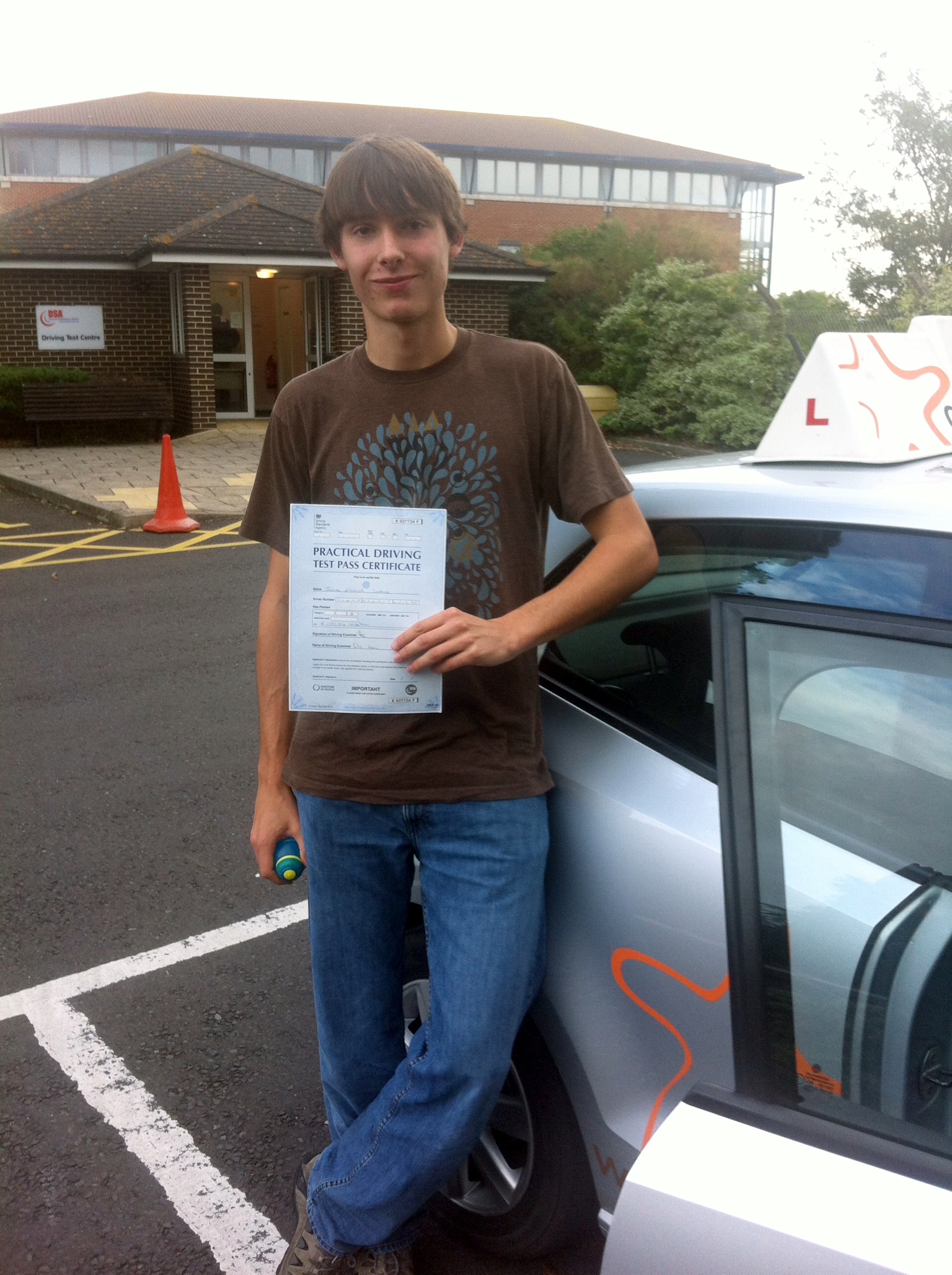 James with his Practical Driving Test Pass Certificate outside Weston-super-mare Driving Test Centre