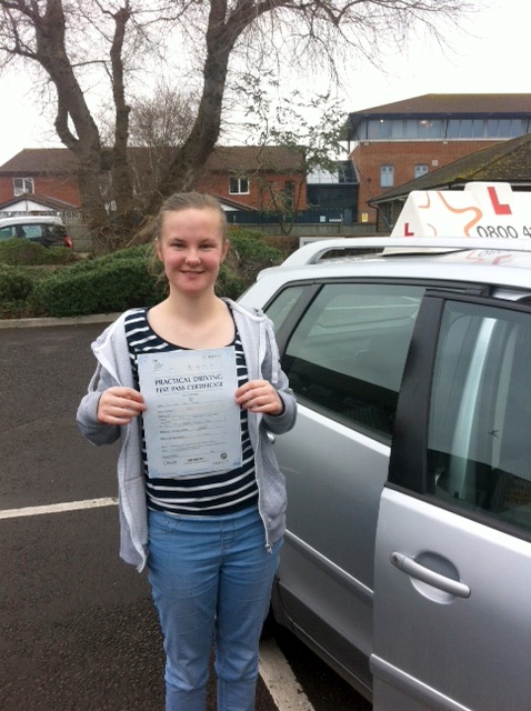 Kate with her Practical Driving Test Pass Certificate outside Weston-super-Mare Driving Test Centre
