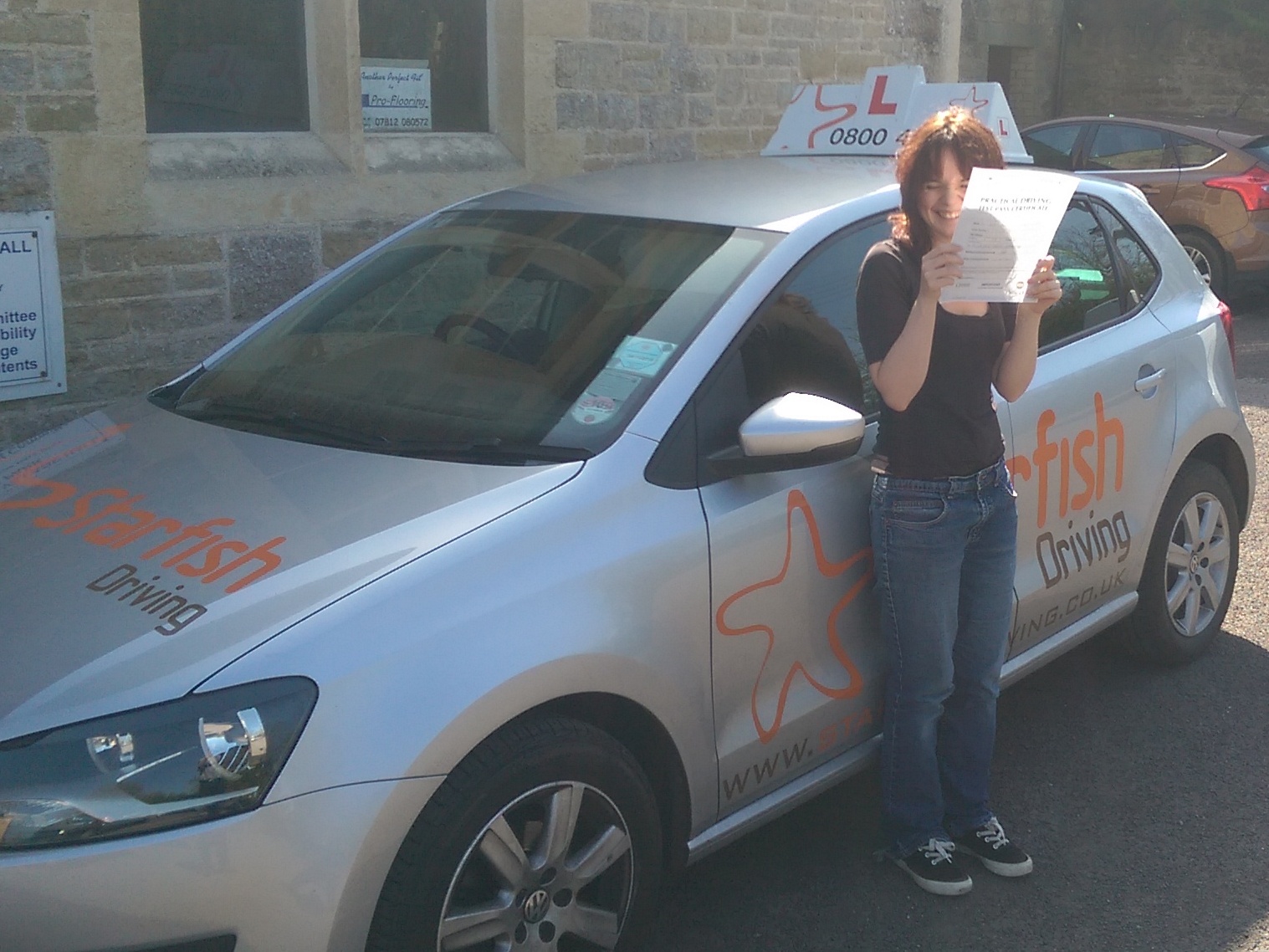 Beth with her Practical Driving Test Pass Certificate.