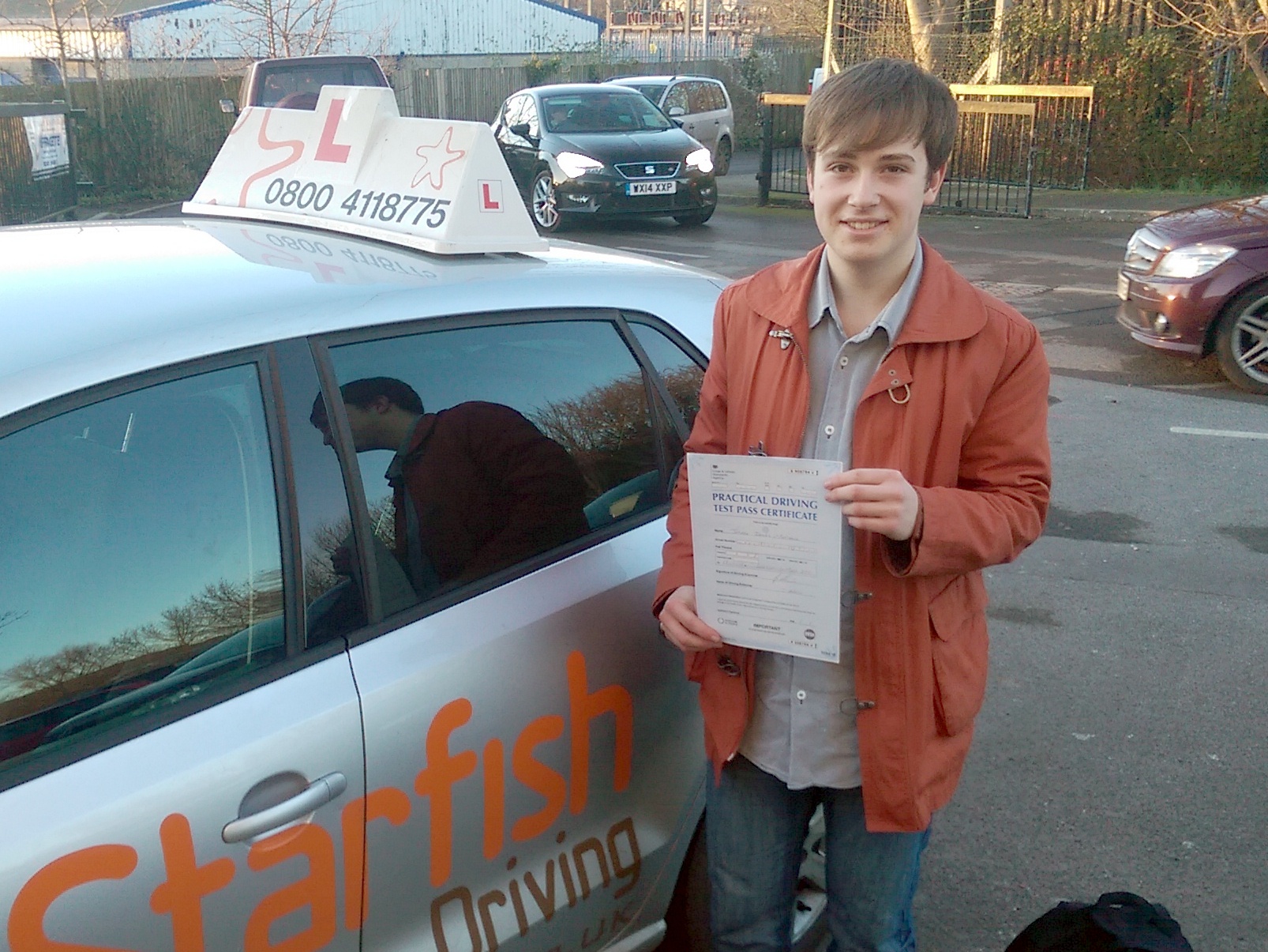 Joe with his Practical Driving Test Pass Certificate somewhere in Cheddar.