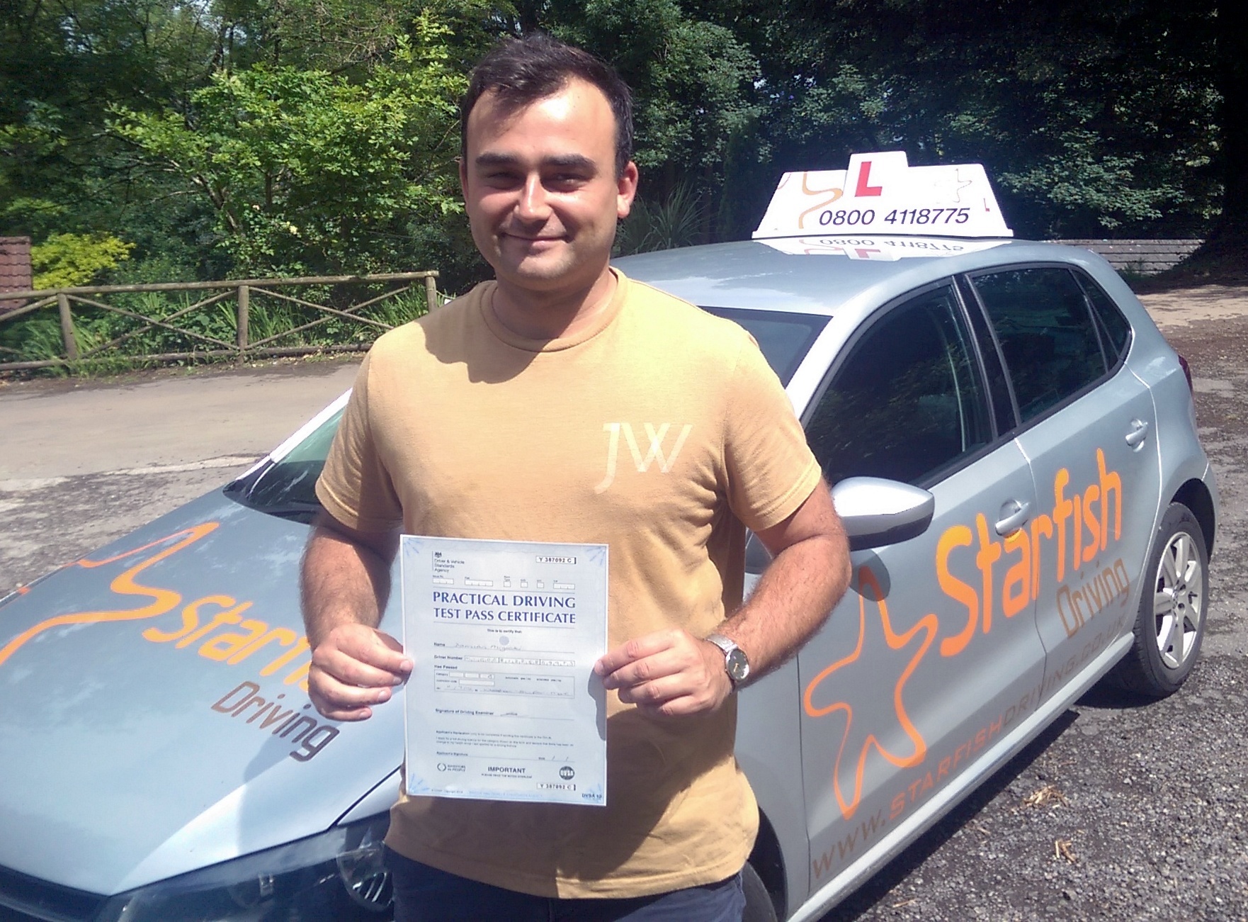Damien with his Practical Driving Test Pass Certificate somewhere in Winscombe