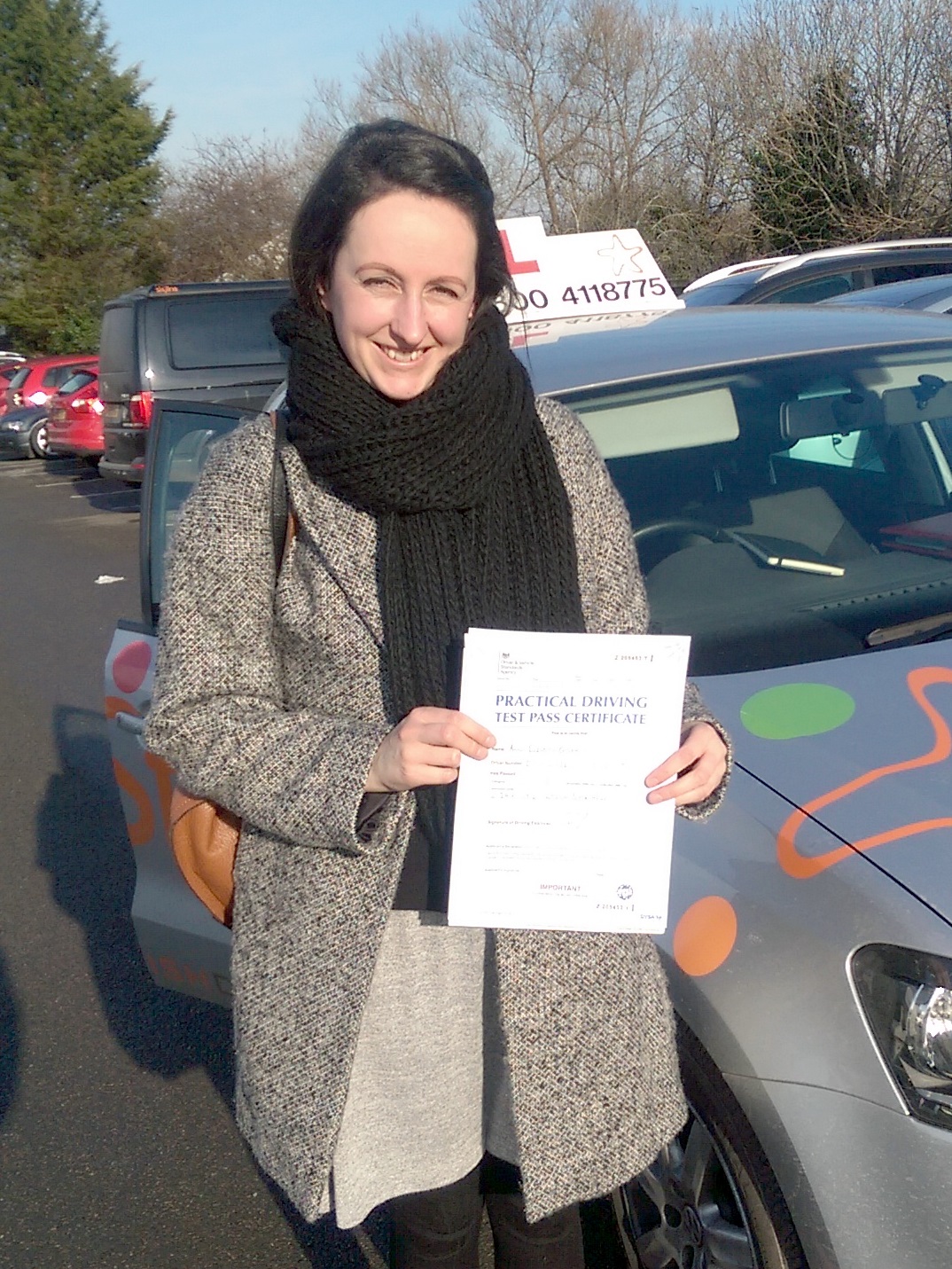 Anna with her Practical Driving Test Pass Certificate.