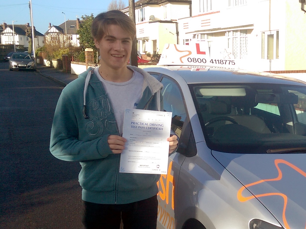 Joseph with his Practical Driving Test Pass Certificate somewhere in Weston